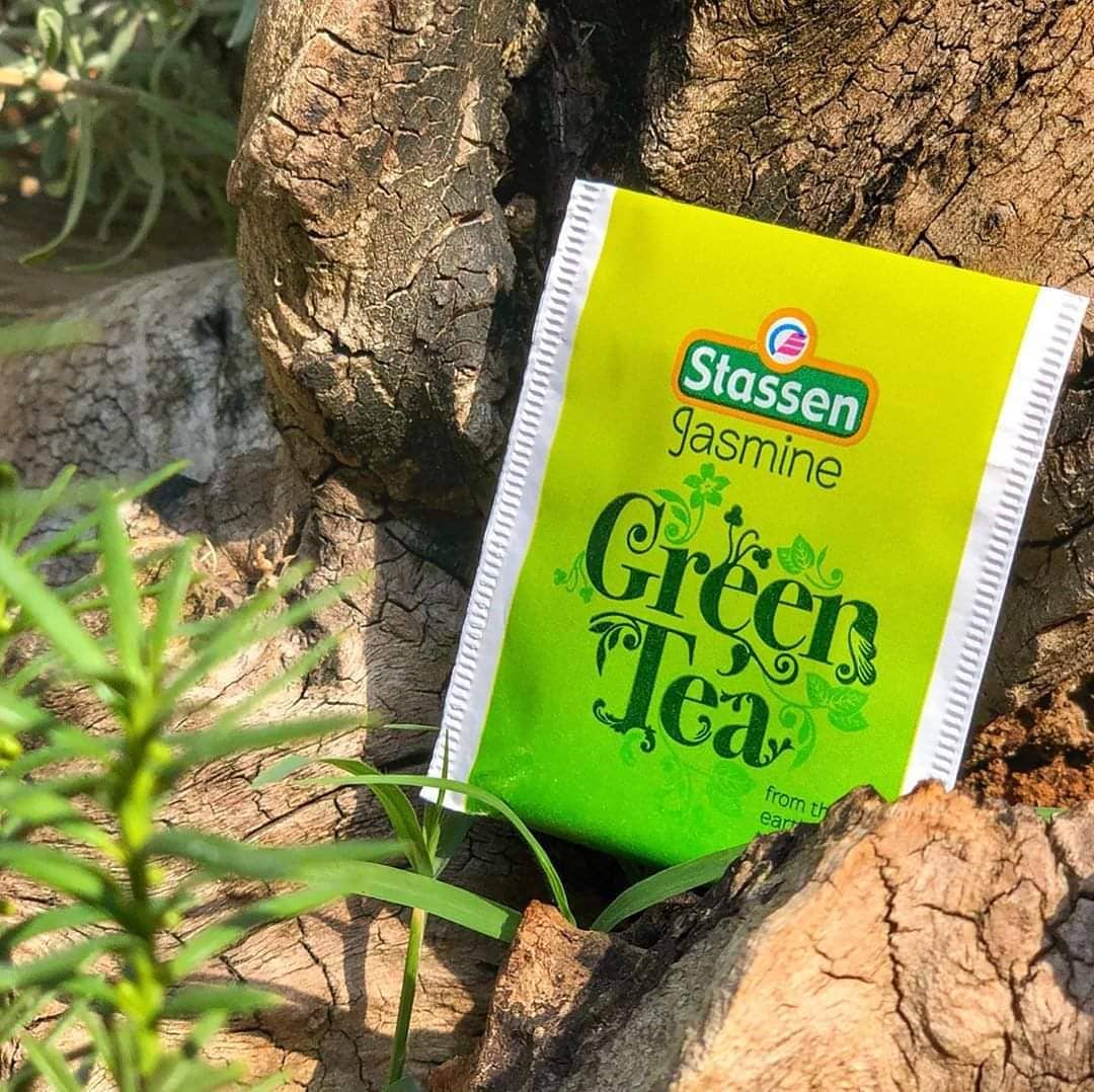 Stassen Jasmine Green Tea enveloped sachet in a natural outdoor setting